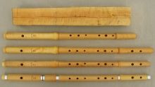 [Photo of curly boxwood flutes with boxwood half log]