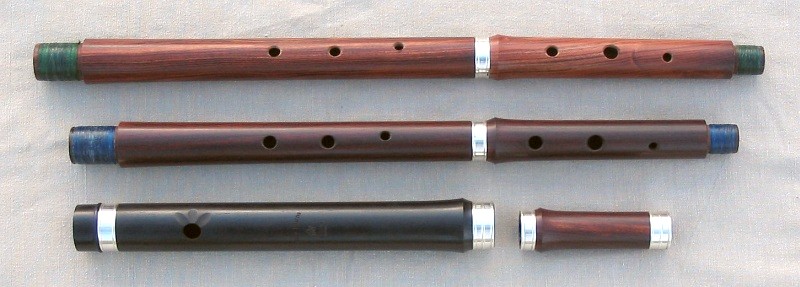 [ Low Flute Combo Package (from top) Mopane Low A upper and lower middle joints with sterling rings, Mopane Low Bb middle joints, shared Blackwood head and foot joints with sterling rings ]